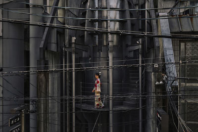 JAPAN - ASIAN TOURIST DRESSED AS AN APPRENTICE GEISHA